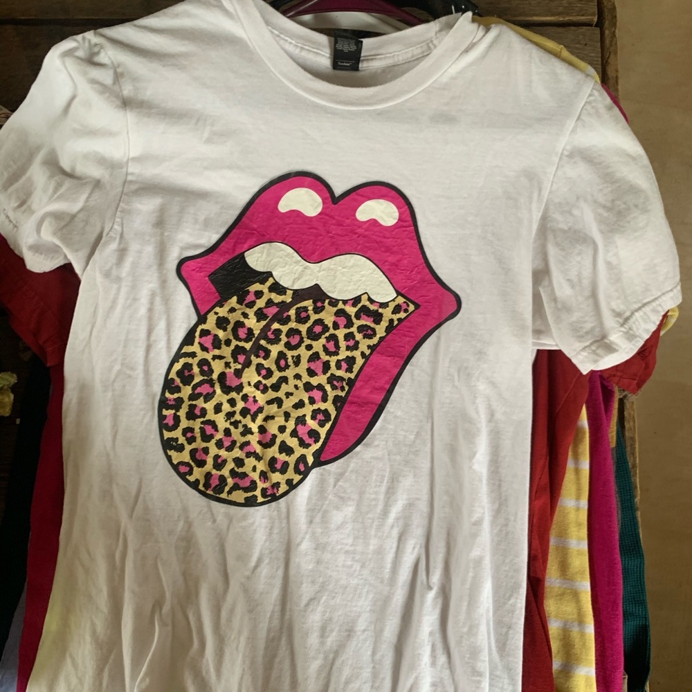 Small, boutique shirt. No stains or tears.